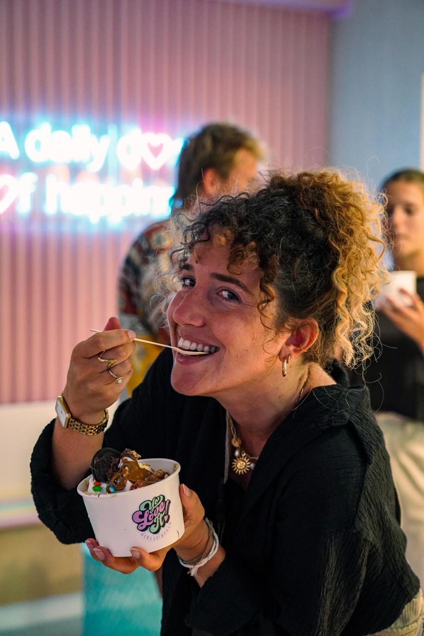 Customer enjoying Yo Love It frozen yoghurt